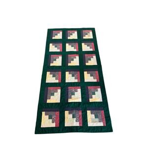 Vintage handmade log cabin quilt with green borders